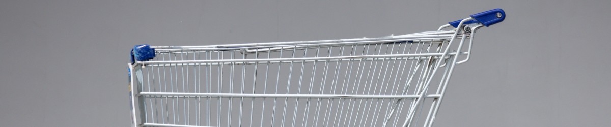 A shopping cart is sitting on the ground