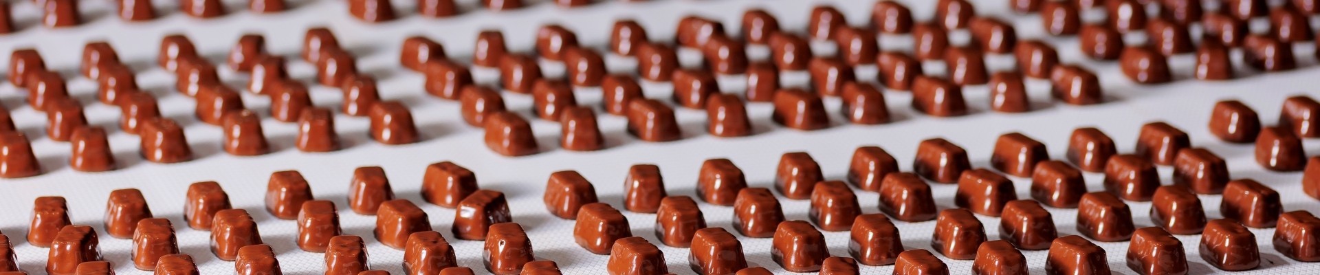 Process chocolate glazing sweets candy